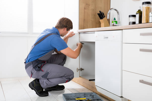 istock Repairman Repairing Cabinet Hinge 847603186