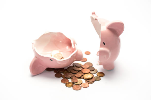 istock Piggy bank broken with money 847605760