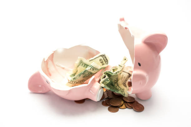 istock Piggy bank broken with money inside 847606042