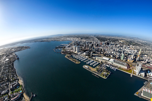 Helicopter point of view of Embarcadero Marina Park in San Diego, USA. The USS Midway Museum is also visible in the image as well as part of Coronado Island.