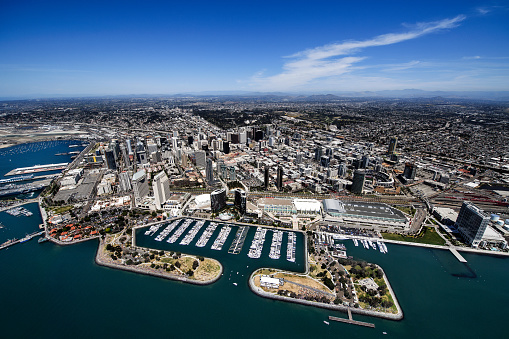 Helicopter point of view of Embarcadero Marina Park in San Diego, USA. The USS Midway Museum is also visible in the image.