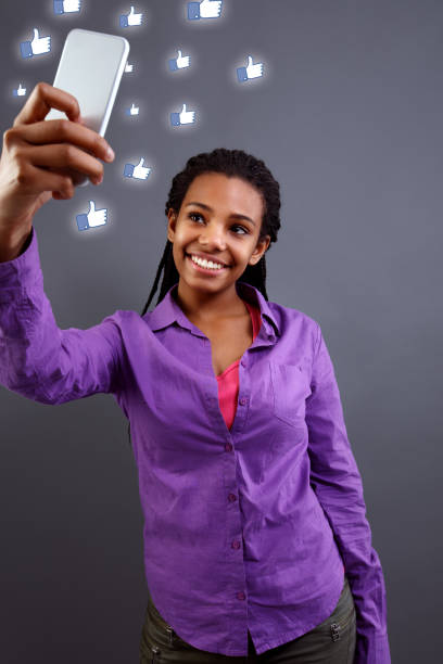 istock teenage taking selfies with her smartphone 847614092