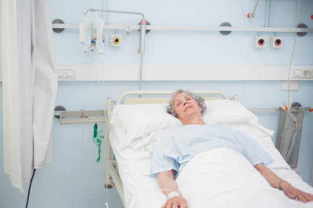 istock Elderly patient sleeping on a medical bed 847618252