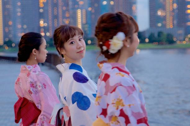 istock Japanese young women in Yukata watching something 847621458