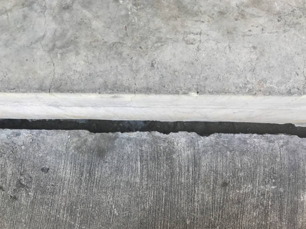 istock crack of the concrete building floor 847622440