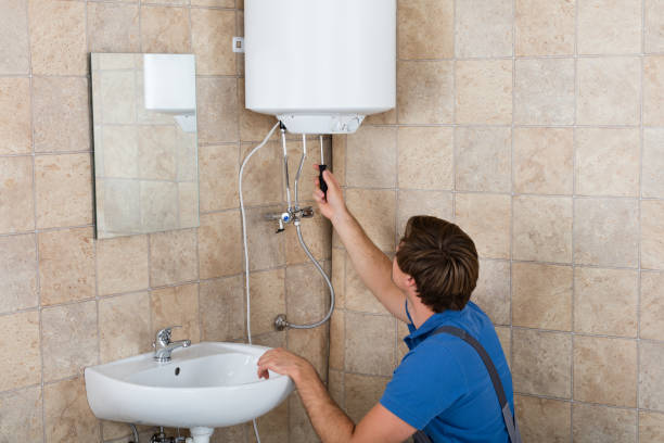 istock Technician Repairing Electric Boiler 847633148