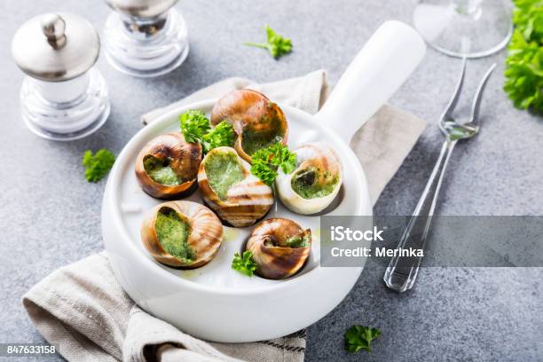 Snails With Garlic Herbs Butter Stock Photo - Download Image Now - Escargot, Snail, Cooking