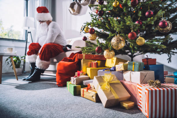 istock christmas tree and gifts 847639976
