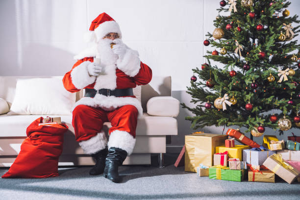 istock santa claus taking medicines 847645030