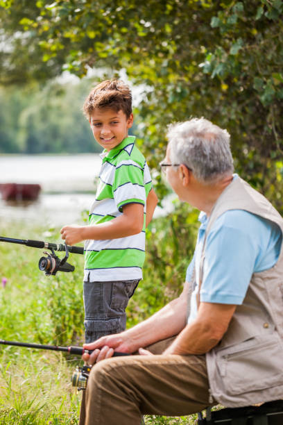 wędkowanie w rzece - fishing rod fishing fishing reel casting zdjęcia i obrazy z banku zdjęć