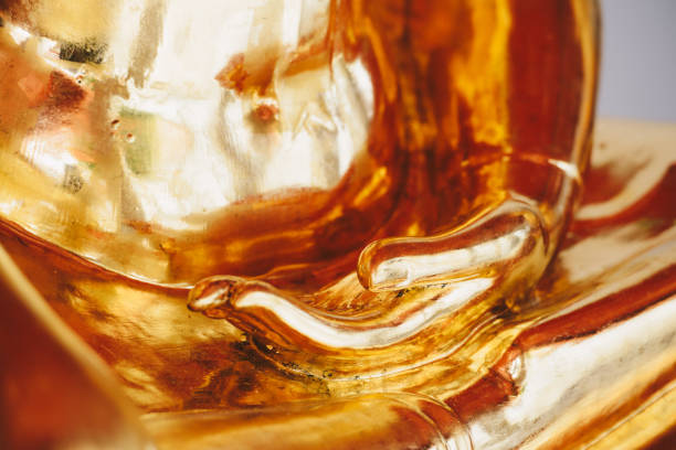 istock Hand of golden Buddha 847663086