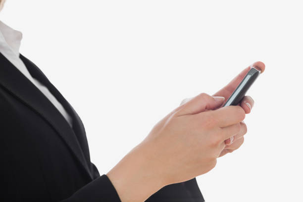 istock Midsection of woman using cell phone 847663146