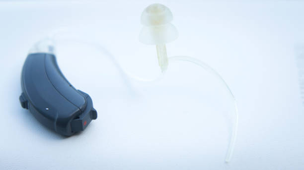istock Modern digital hearing aid device for deaf and hard of hearing patients. 847663894