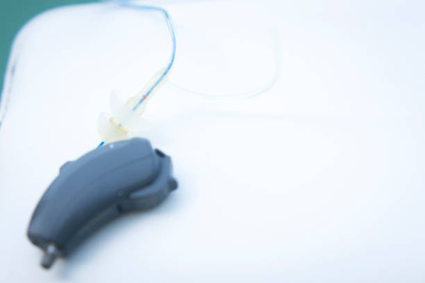 istock Modern digital hearing aid device for deaf and hard of hearing patients. 847664082