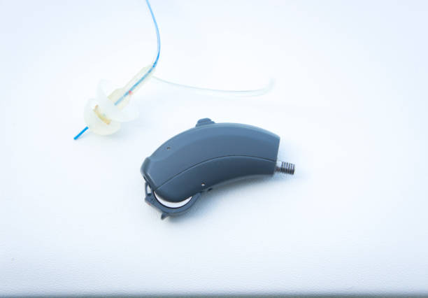 istock Modern digital hearing aid device for deaf and hard of hearing patients. 847664158