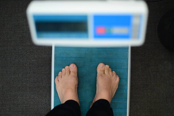 istock a person on the scales 847664850