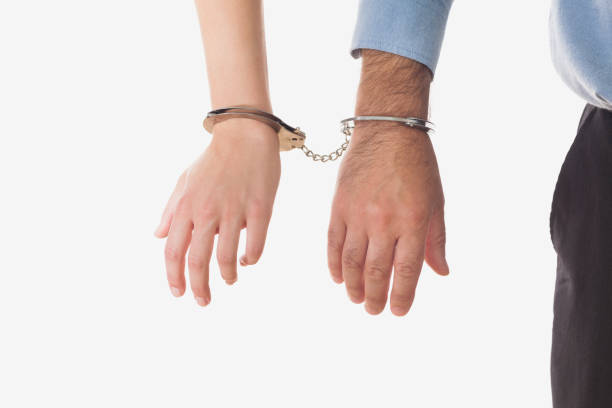 istock Businesspeople handcuffed together 847664918