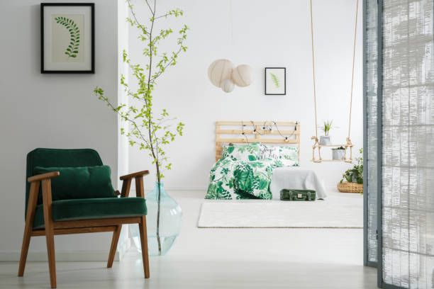istock Dark green chair in bedroom 847674462