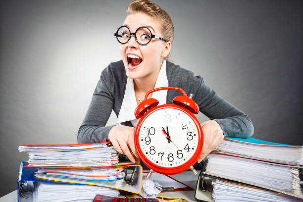 istock Emotional secretary with clock. 847680722