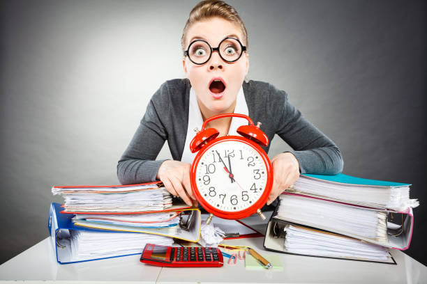 istock Emotional secretary with clock. 847680764