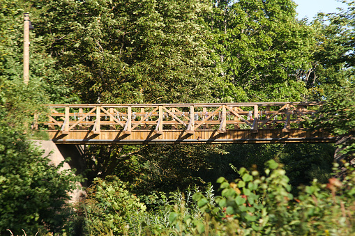 Wood bridge over old river.