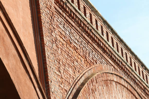 istock Countryside brick view of old bridge over small river. 847683376