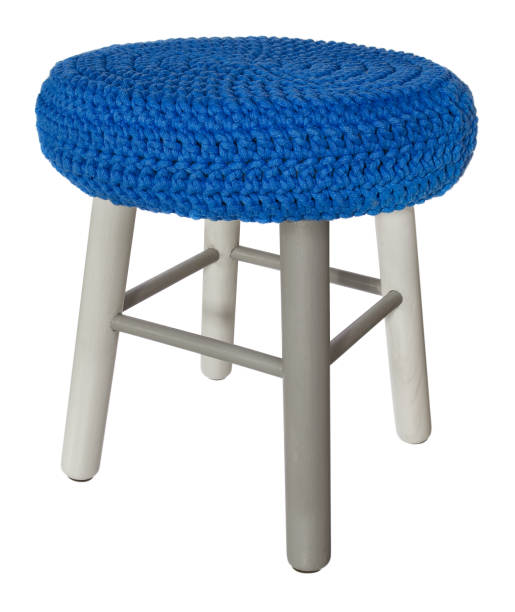 istock Handmade stool wooden gray and white. Round seat with blue woolen material. 847688892