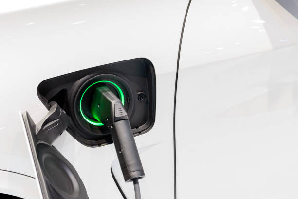 istock The electric car charger plugged in to the socket. 847689574