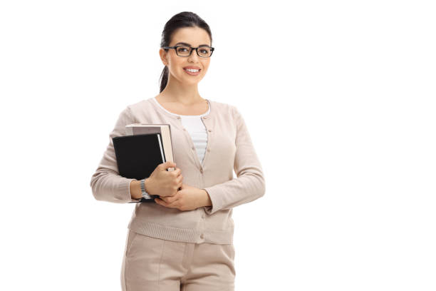 Female teacher looking at the camera and smiling isolated on white background