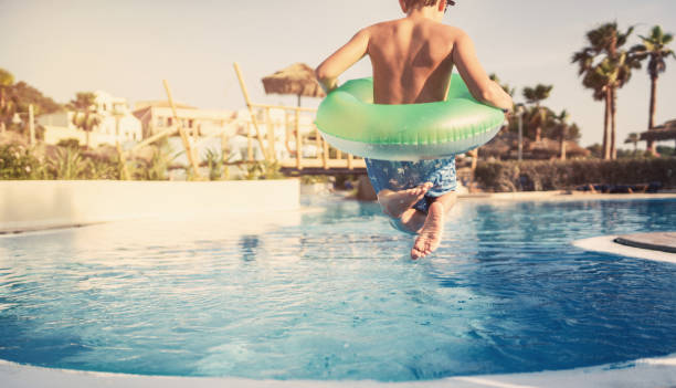 istock Summer activities in the swimming pool 847690536