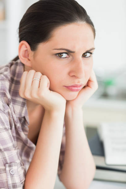 istock Upset woman looking at camera 847702158