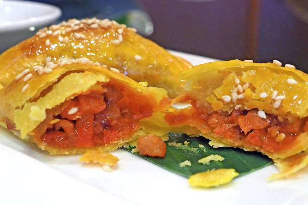 istock asian style food - Deep fried roasted pork puff served on white dish 847702772