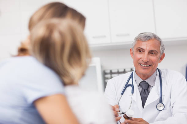 istock Doctor holding a drug box 847706100