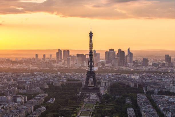istock Eiffel Tower rooftop view with at sunset in Paris, France 847706262