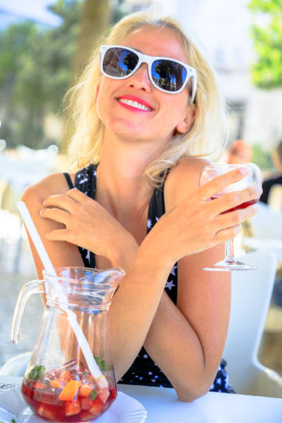 istock Woman drinking sangria 847706462