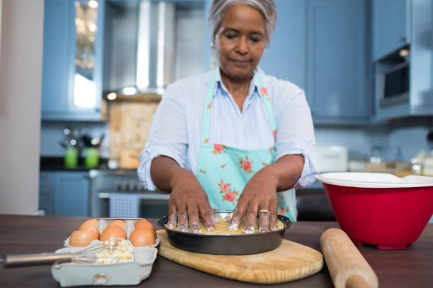istock Woman preparing food 847713380