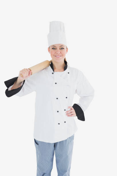 istock Happy female chef in unifrom holding rolling pin 847717638