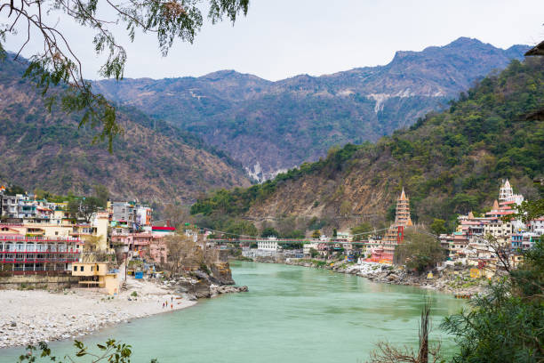 istock Rishikesh, holy town and travel destination in India. The Ganges River flowing between mountain from the Himalayas 847717700