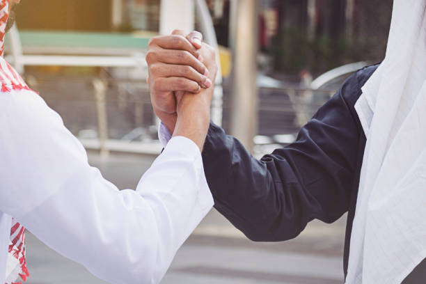 istock Arab businessmen worker handshaking on construction site 847728058