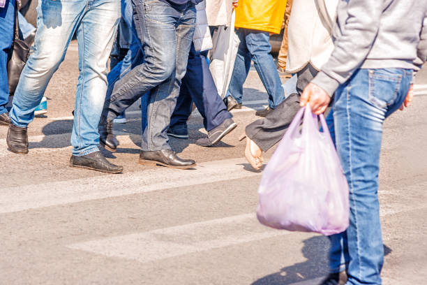 istock crossroad with walking pedestrians 847730706
