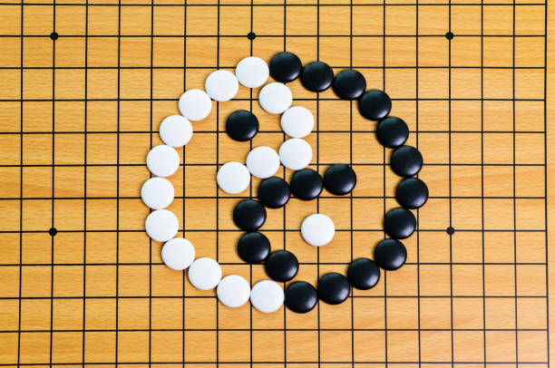istock Yin yang symbol on go game board 847731034