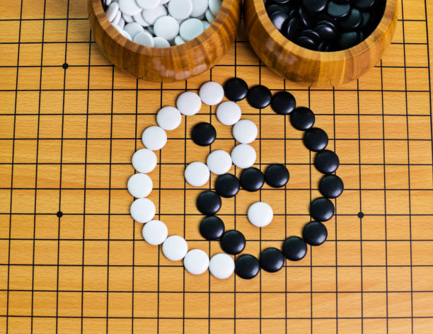 istock Yin yang symbol on go game board 847731294