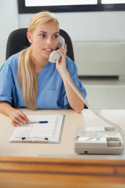 istock Female nurse holding a phone 847734362