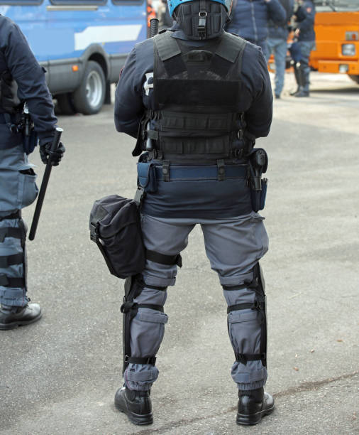 istock police in riot gear with batons during a protest i 847734800