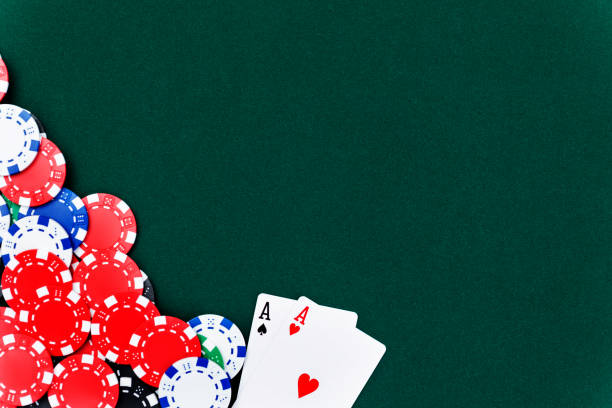 istock A pair of aces and poker chips on card table 847741250
