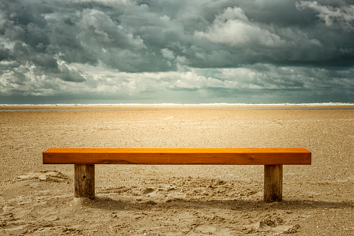 empty bench at the beach