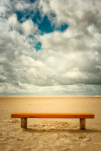 empty bench at the beach