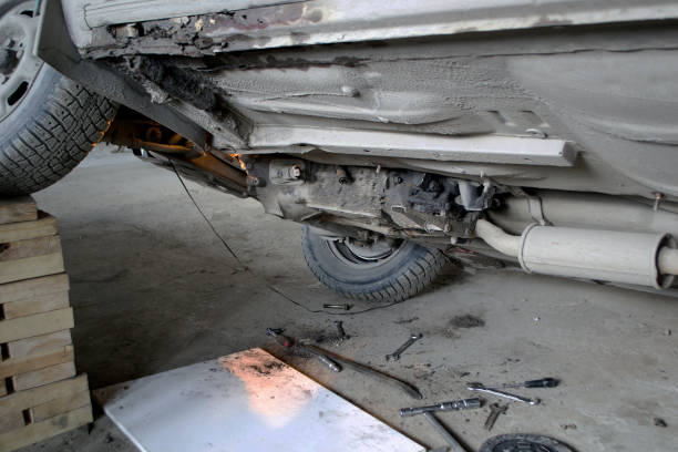 istock Repair of an old car. Bottom view. 847752696