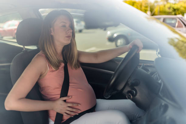 istock Pregnant Woman  driving her car 847763496