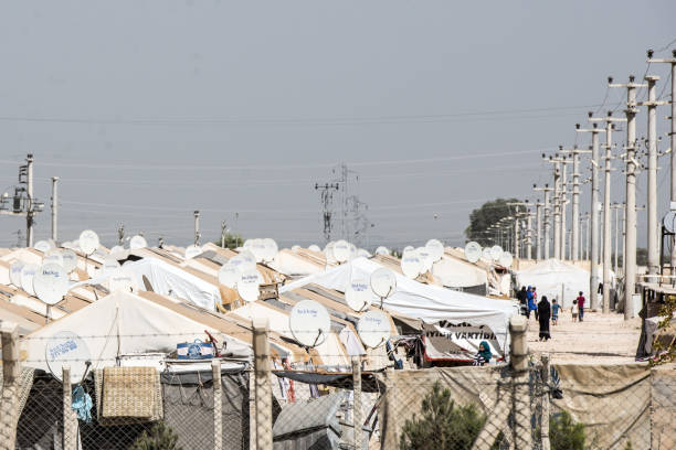 refugee camop in Akcakale Akcakale, Turkey - September 6, 2017. Syrian official refugee camp in Akcakale. This camp is for syrian people from Idlib, Aleppo and Rakka. akçakale stock pictures, royalty-free photos & images